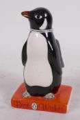 A Royal Doulton Penguin books 'Best Wishes' porcelain figure of a penguin, 5" high