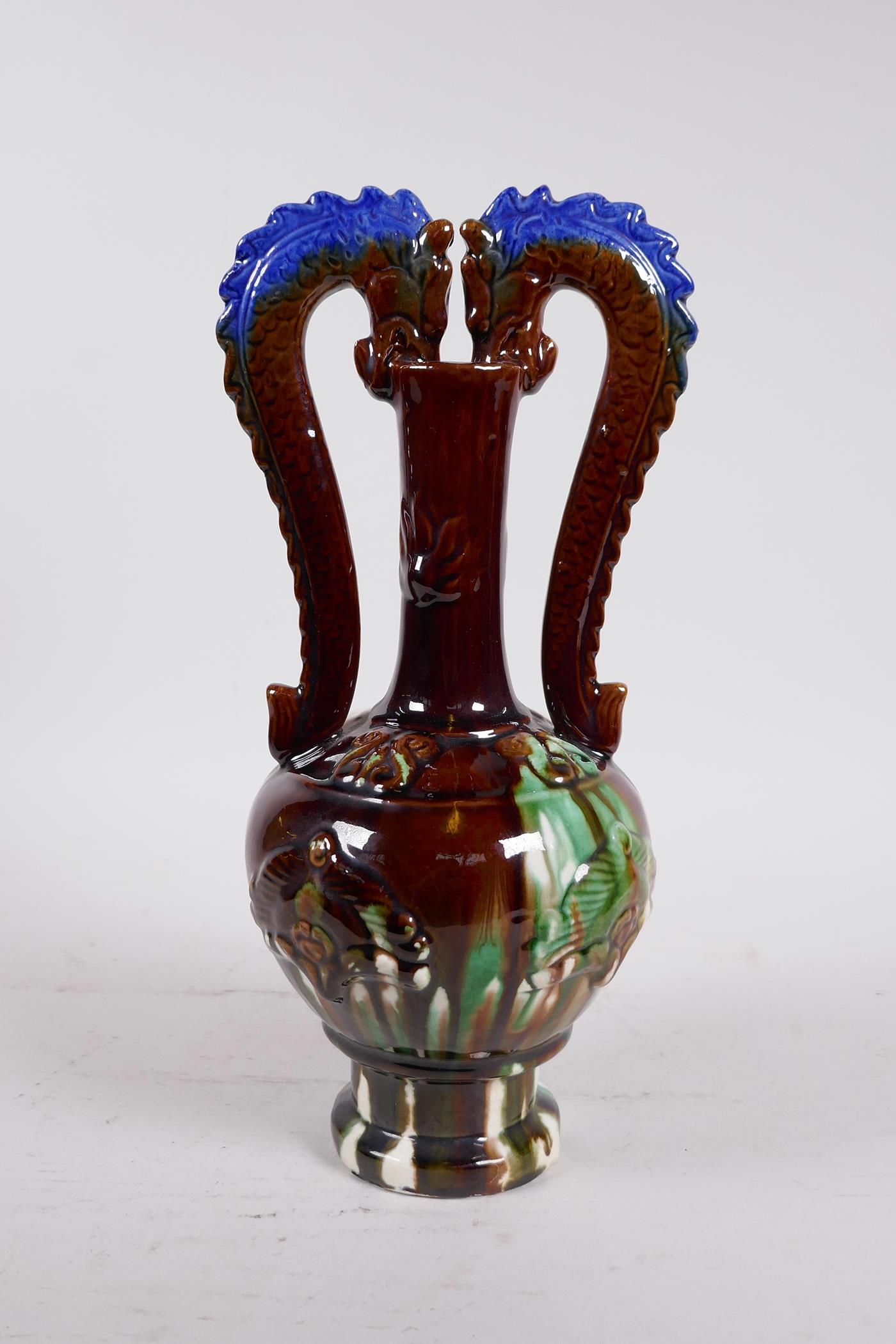 A Chinese Sancai glazed pottery vase with a slender neck and two handles in the form of dragons, - Image 3 of 6