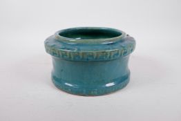 A Chinese turquoise glazed pottery jardiniere, indistinct impressed mark to base, 8½" diameter