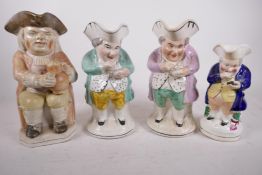 Four antique Staffordshire Toby jugs, a Ralph Wood style 'Toper' and three snuff takers, largest 10"
