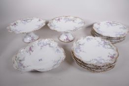 A Limoges dessert service, with transfer printed decoration in gilt borders, comprising eight