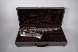 A vintage French J. Gras 'Prima' saxophone and travel case, 23½" x 10"