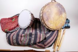 A pair of Indian metal drums in a woollen bag, 15" diameter