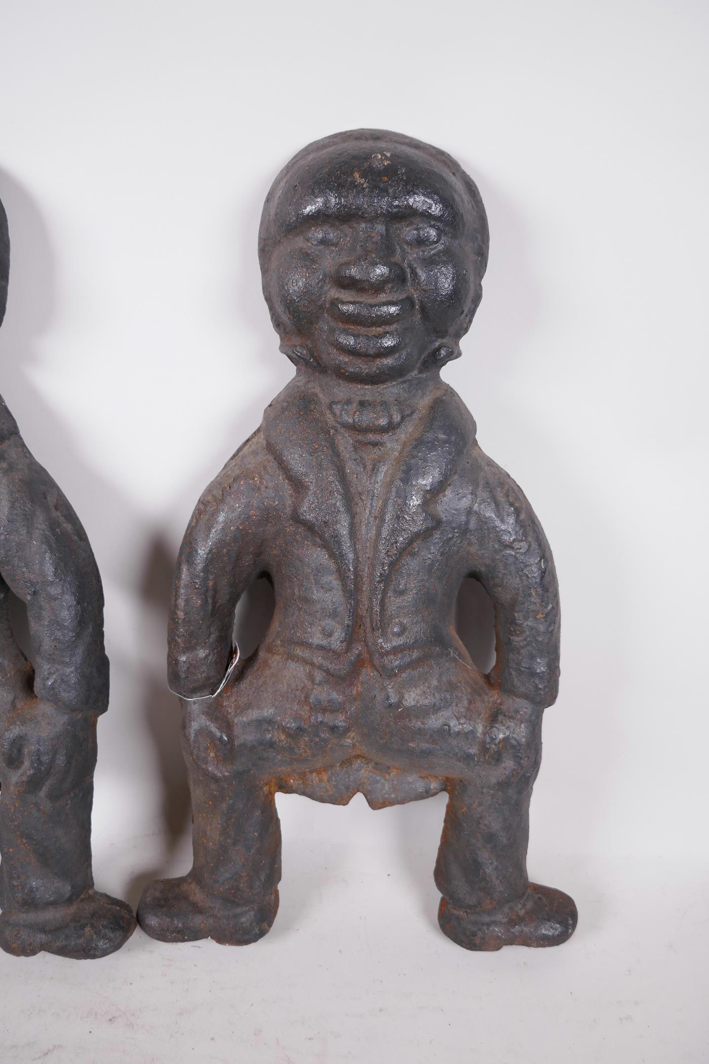 A pair of cast iron fire dog ends in the form of blackamoors, 16" high - Image 3 of 3
