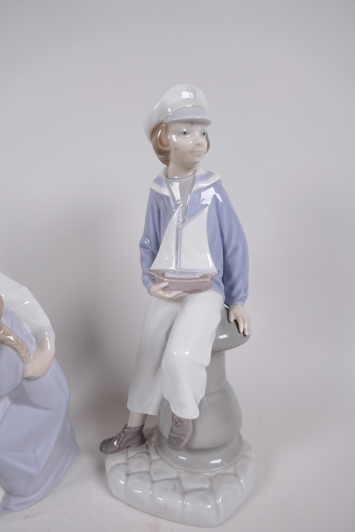 Three Lladro figurines, 'Girl with Geese', 'Sailor Boy' and 'Two Children at Bedtime', tallest 10" - Image 4 of 4