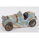 A Riprod Vietata C.C. Art 2598 pottery model of a 1924 Bugatti decanter made for D.V.M. Anisette