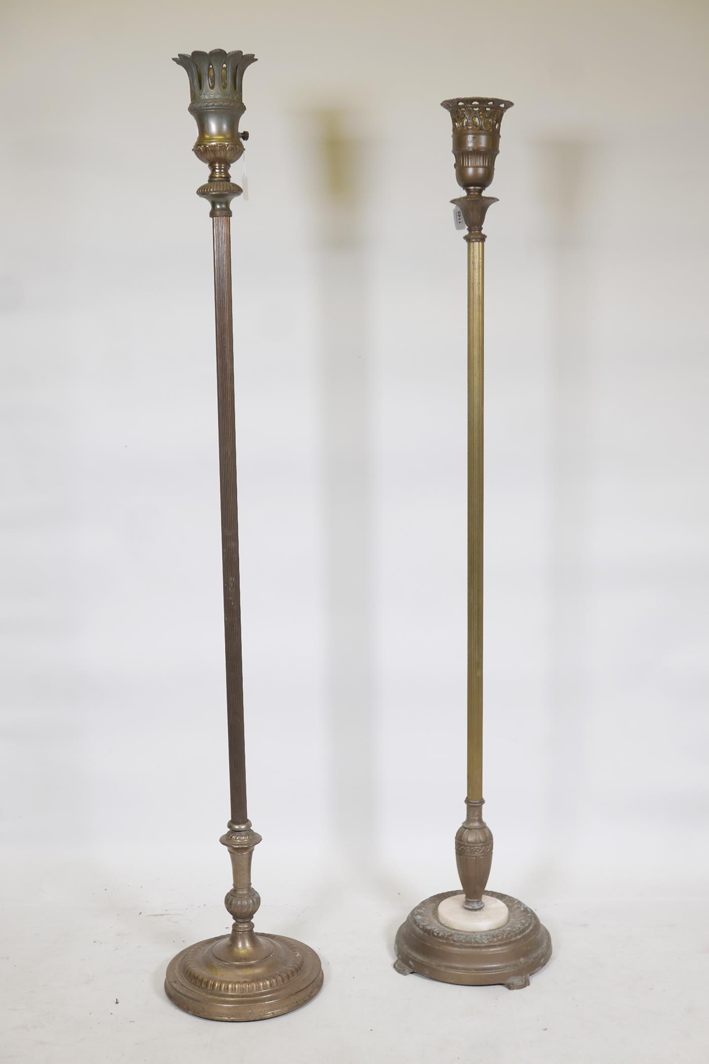 A brass floor lamp/uplighter, and another similar, 61" high