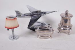 A 1950s/60s table lighter in the form of a fighter aircraft, a silver plated cigar lighter in the