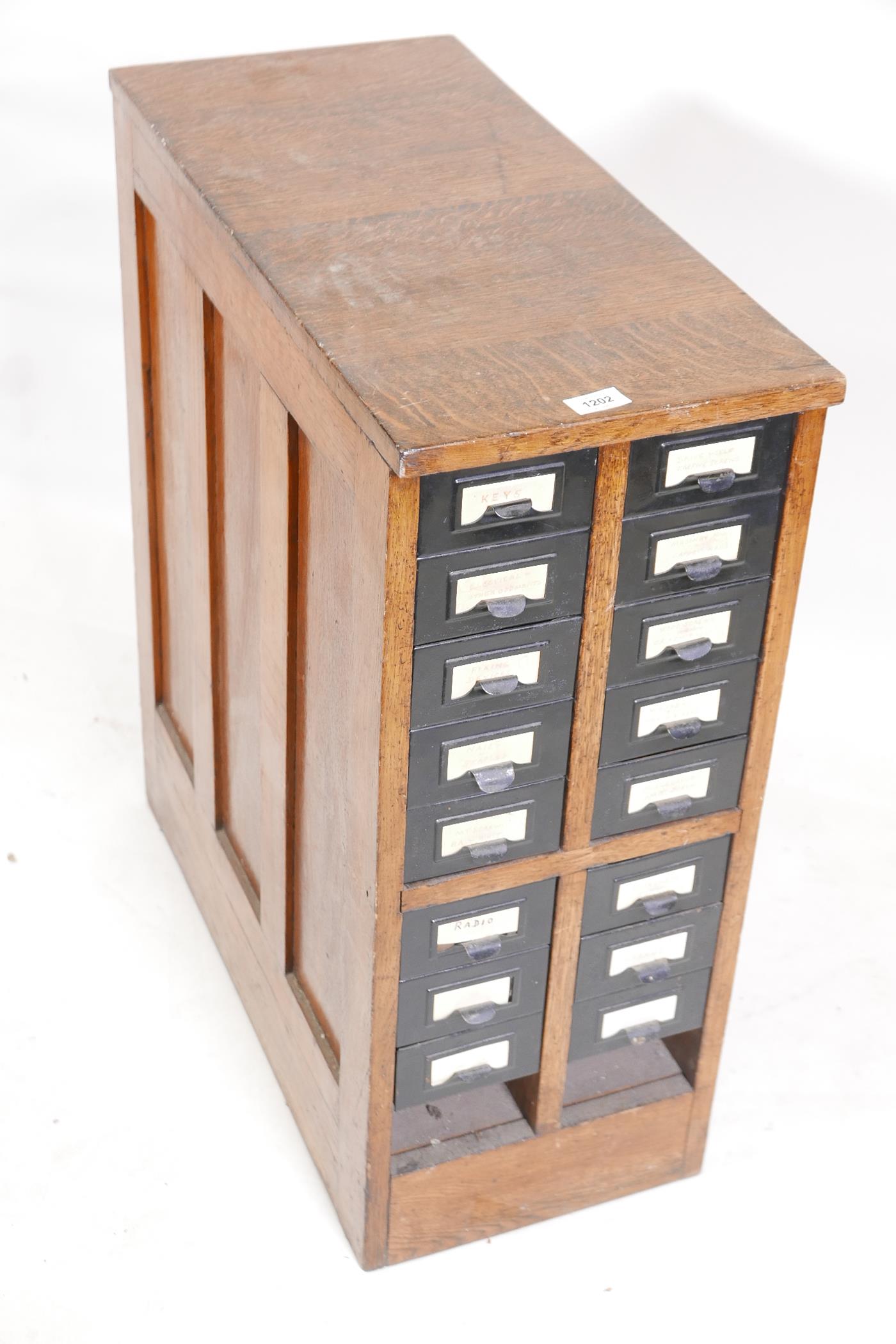 An oak filing cabinet with sixteen metal drawers, lacks two drawers, 12" x 27" x 30" - Image 2 of 2