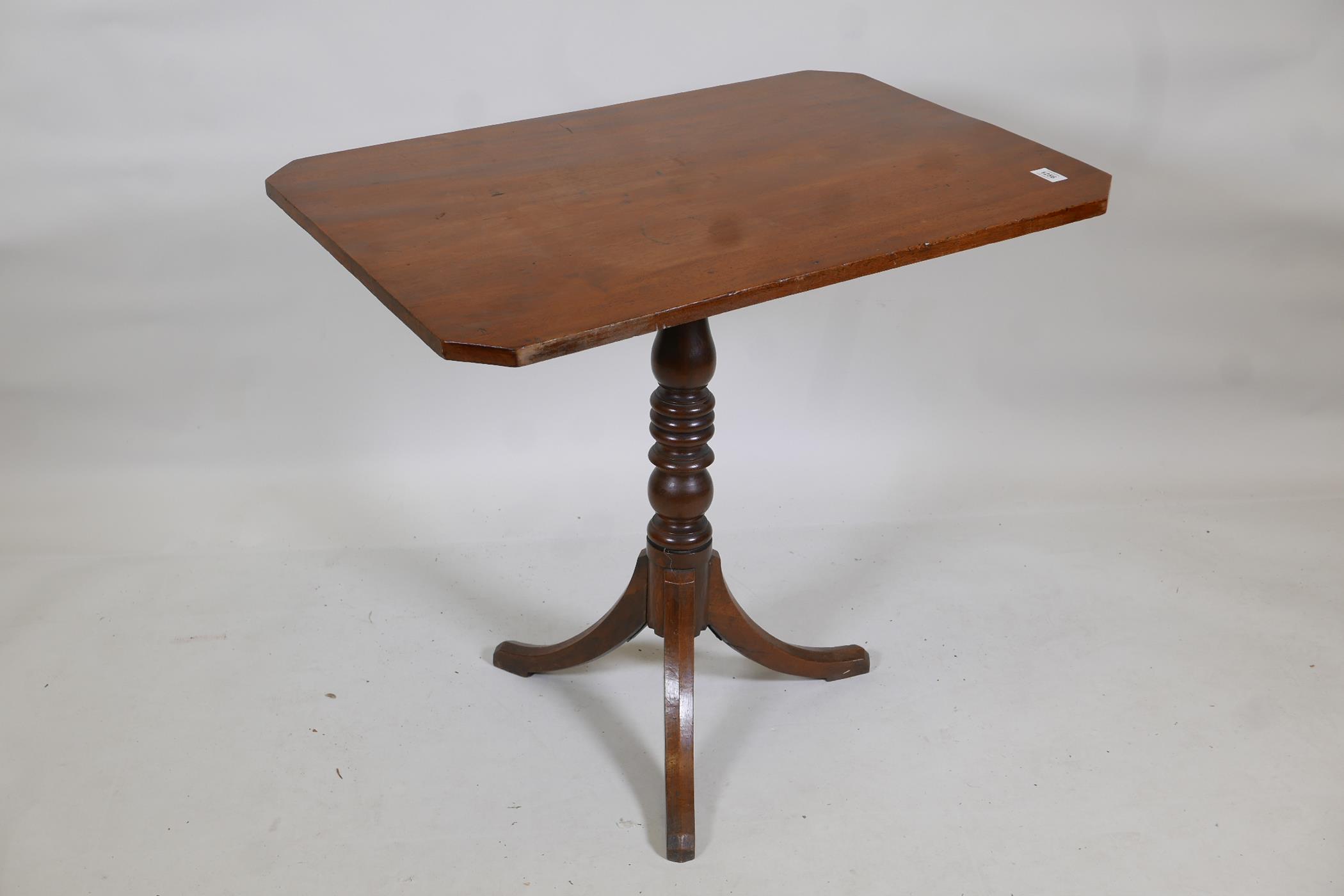 A C19th mahogany tilt top occasional table, with canted corner top, raised on turned column and - Image 2 of 2