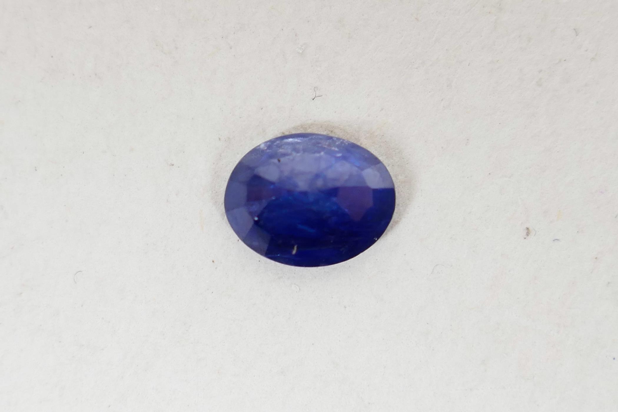 A 1.06ct blue sapphire, oval mixed cut, ITLGR certified, with certificate - Image 4 of 7