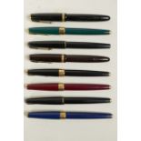 Two Parker Duofold fountain pens with 14ct gold nibs, together with six Parker 17 fountain pens, 5½"