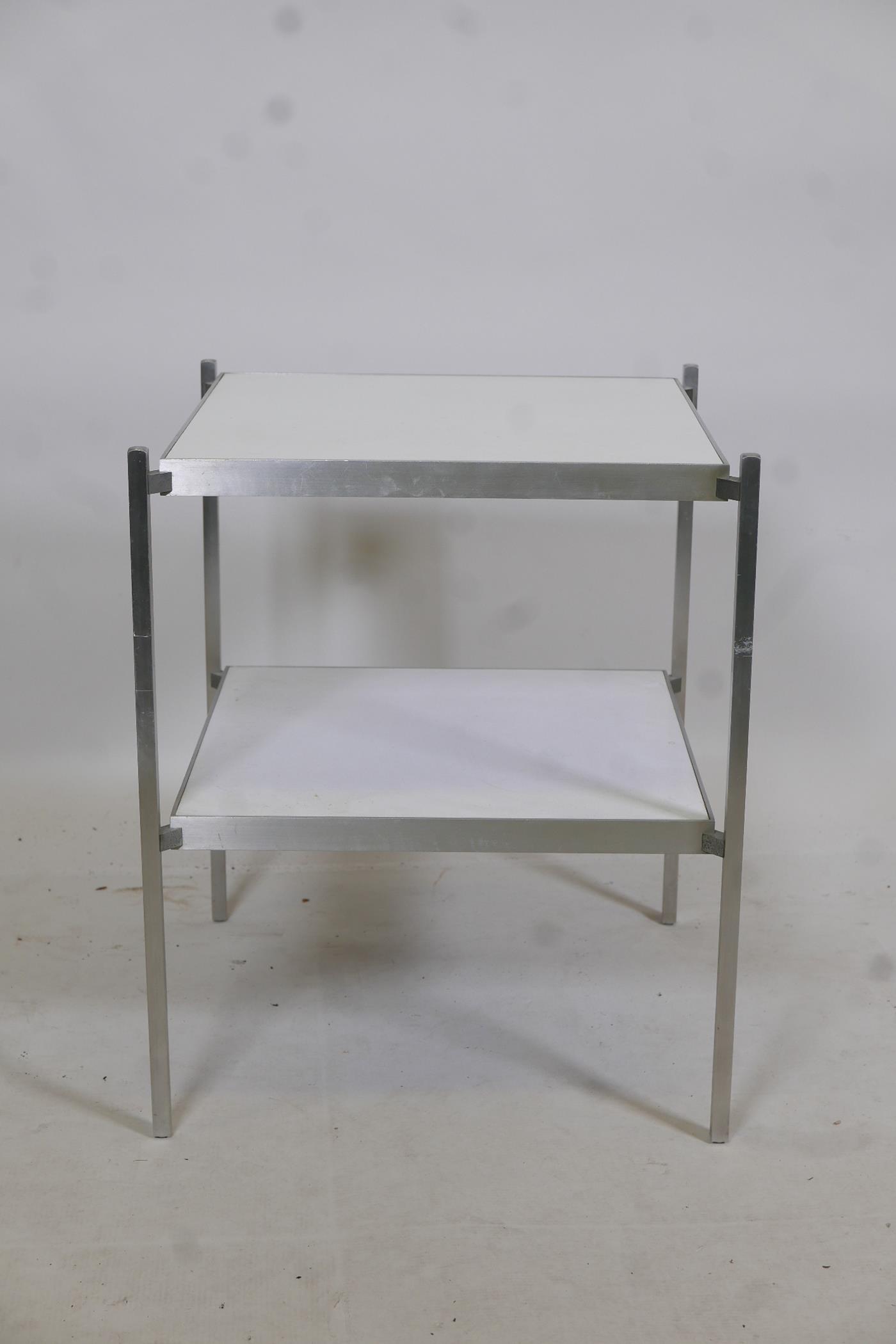 A late C20th brushed aluminium two tier occasional table, inscribed to base reg design. 919338, - Image 2 of 3