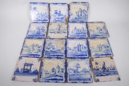 Fifteen antique Delft blue and white tiles decorated with figures, windmills, buildings and boats