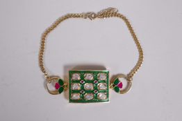 A silver gilt, enamel and uncut diamond bracelet in the Persian style, 8" long