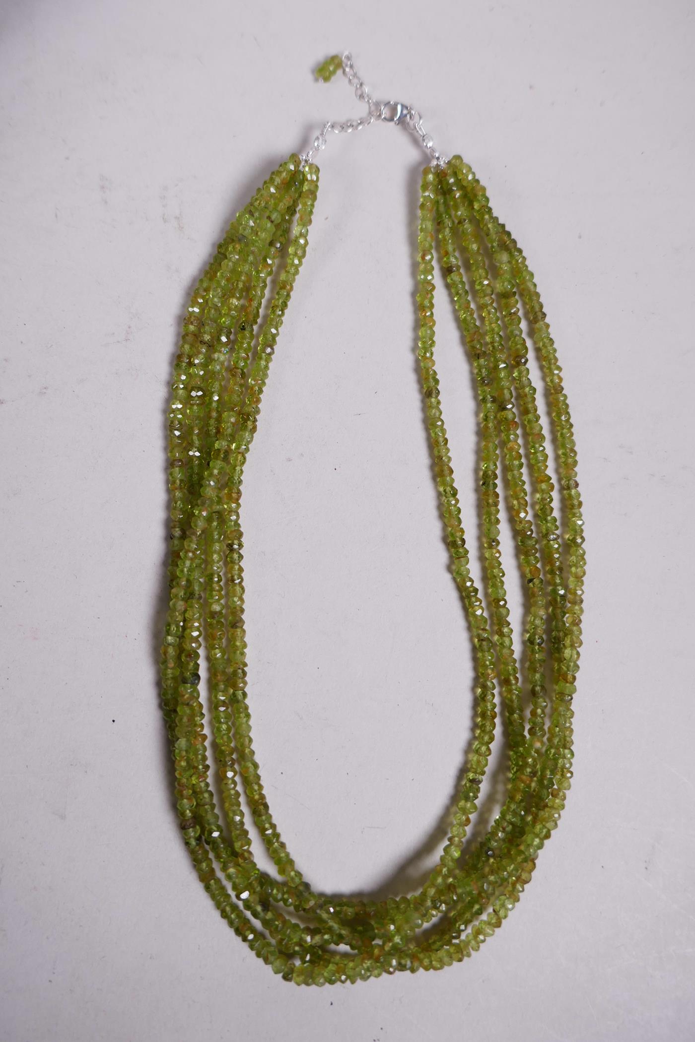 A four row green peridot gemstone necklace, with adjustable silver clasp, 18" long - Image 7 of 8