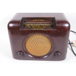 A vintage Bush Bakelite cased valve radio, type DAC 90A, 12" wide