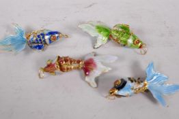Four articulated enamel fish pendants, 2½" long