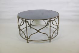 A painted wrought steel centre table with tinted glass top, 36" diameter x 20"