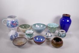 A collection of 12 studio bowls and pots, most signed SMH, and a jug signed Peggy Ibertson, 8" high