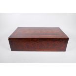 A C19th rosewood writing slope, with fitted interior and inlaid decoration of satinwood panels,