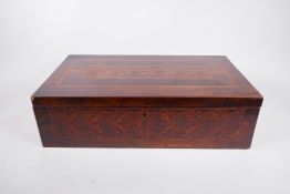 A C19th rosewood writing slope, with fitted interior and inlaid decoration of satinwood panels,