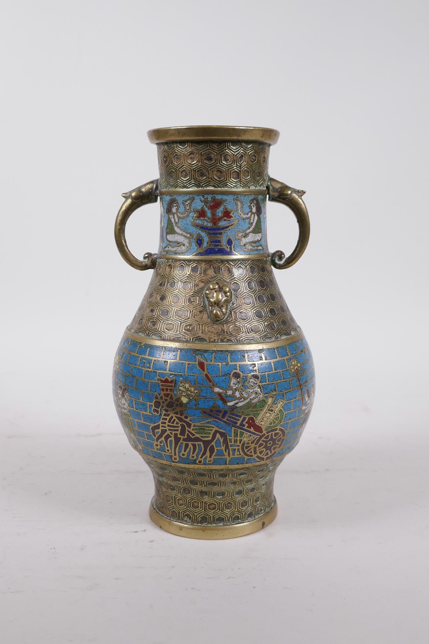 An Eastern bronze cloisonne two handled vase of Chinese form, the cloisonne bands with Egyptian