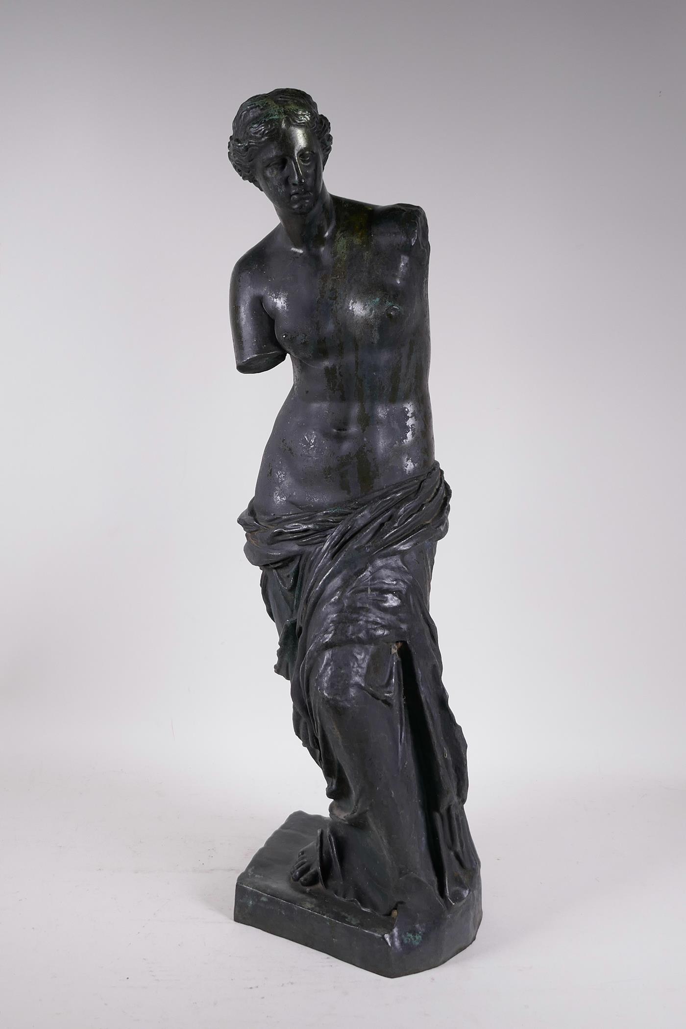 An early C19th bronze figure of the Venus de Milo, well patinated and inscribed to base, reduction