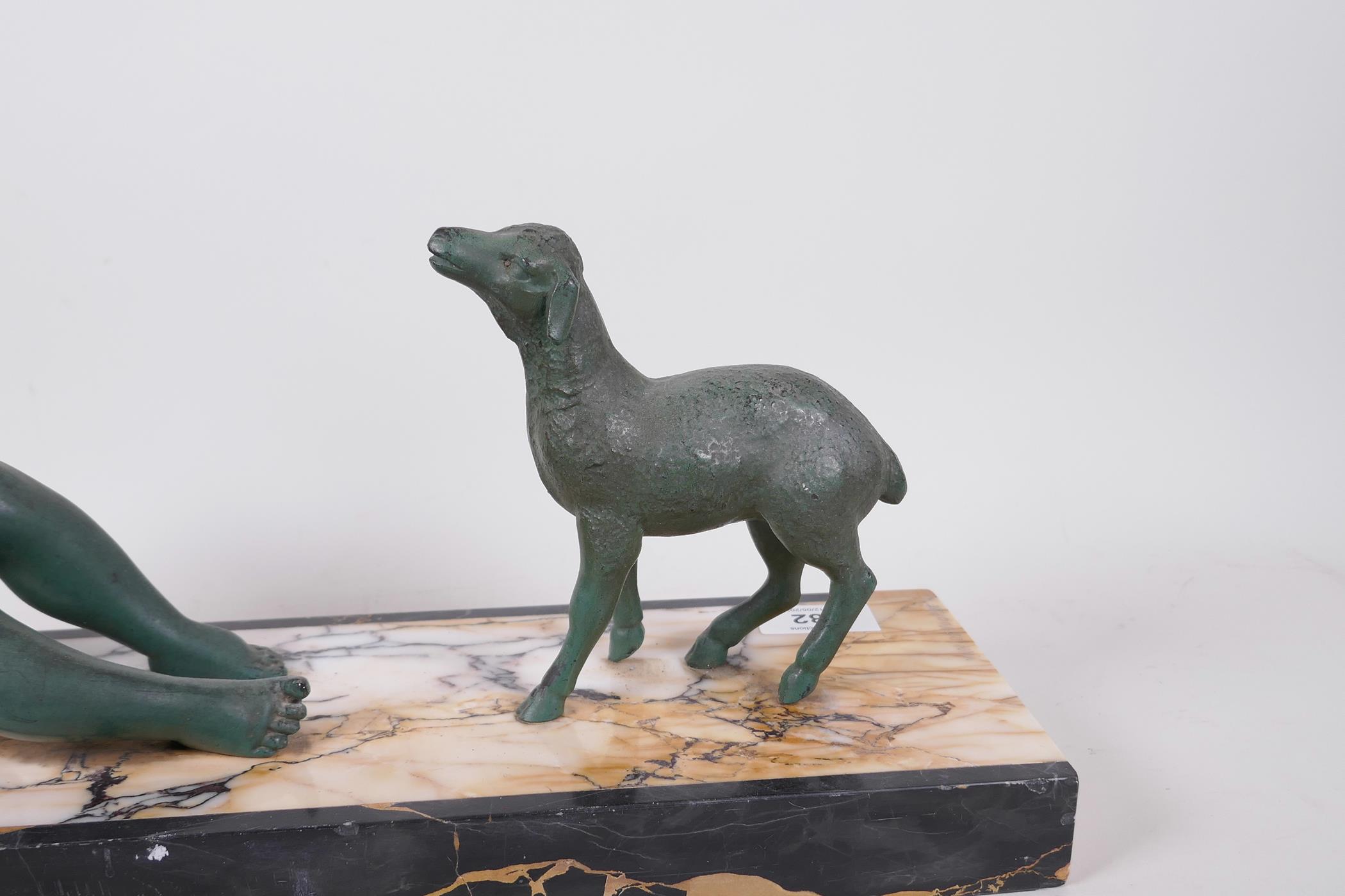 An Art Deco bronzed spelter figure of a young girl and lamb, mounted on a marble base, signed Van de - Image 3 of 4