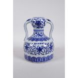 A Chinese blue and white porcelain flask with two handles, with floral decoration, 6 character