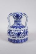A Chinese blue and white porcelain flask with two handles, with floral decoration, 6 character