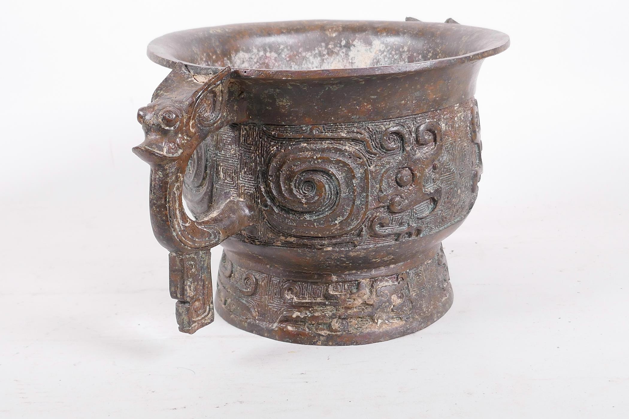 A Chinese bronze two handled censer with raised archaic style decoration, 12" x 6" high - Image 2 of 5