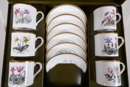 A Royal Worcester cabaret set of six coffee cups and saucers, individually painted with