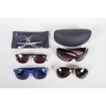 A collection of assorted designer and other sunglasses, including Yves Saint Laurent, Bruce Oldfield