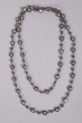 An uncut diamond necklace, 40" long