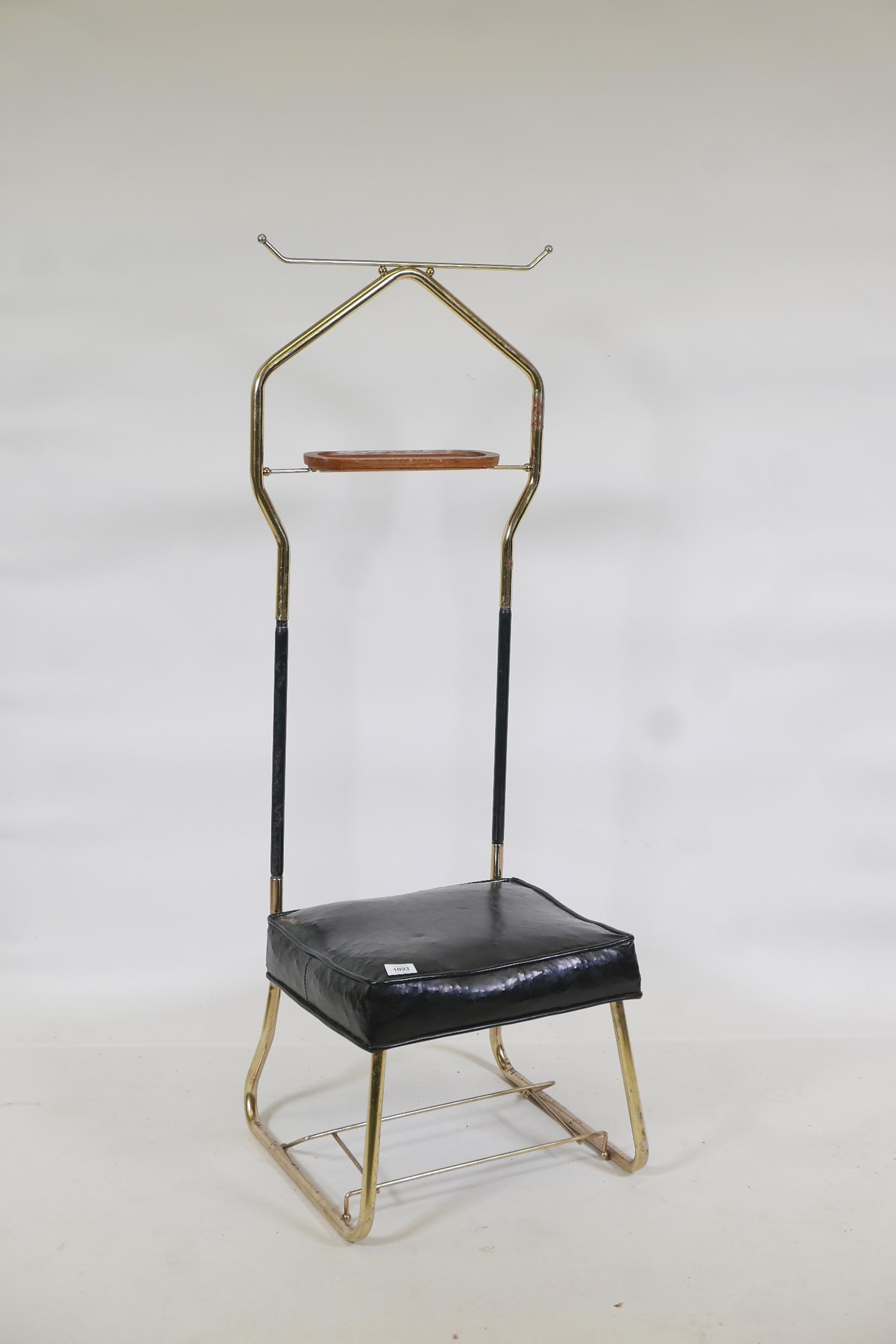 A mid century valet, with leather stool and brass hanging rack, 18" x 15" x 50"