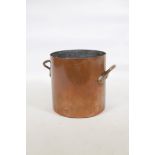 A large copper pot with two handles, 15" diameter x 16" high
