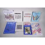 A collection of pen collecting reference books, including 'Parker Vacumatic' and 'Parker Duofold' by