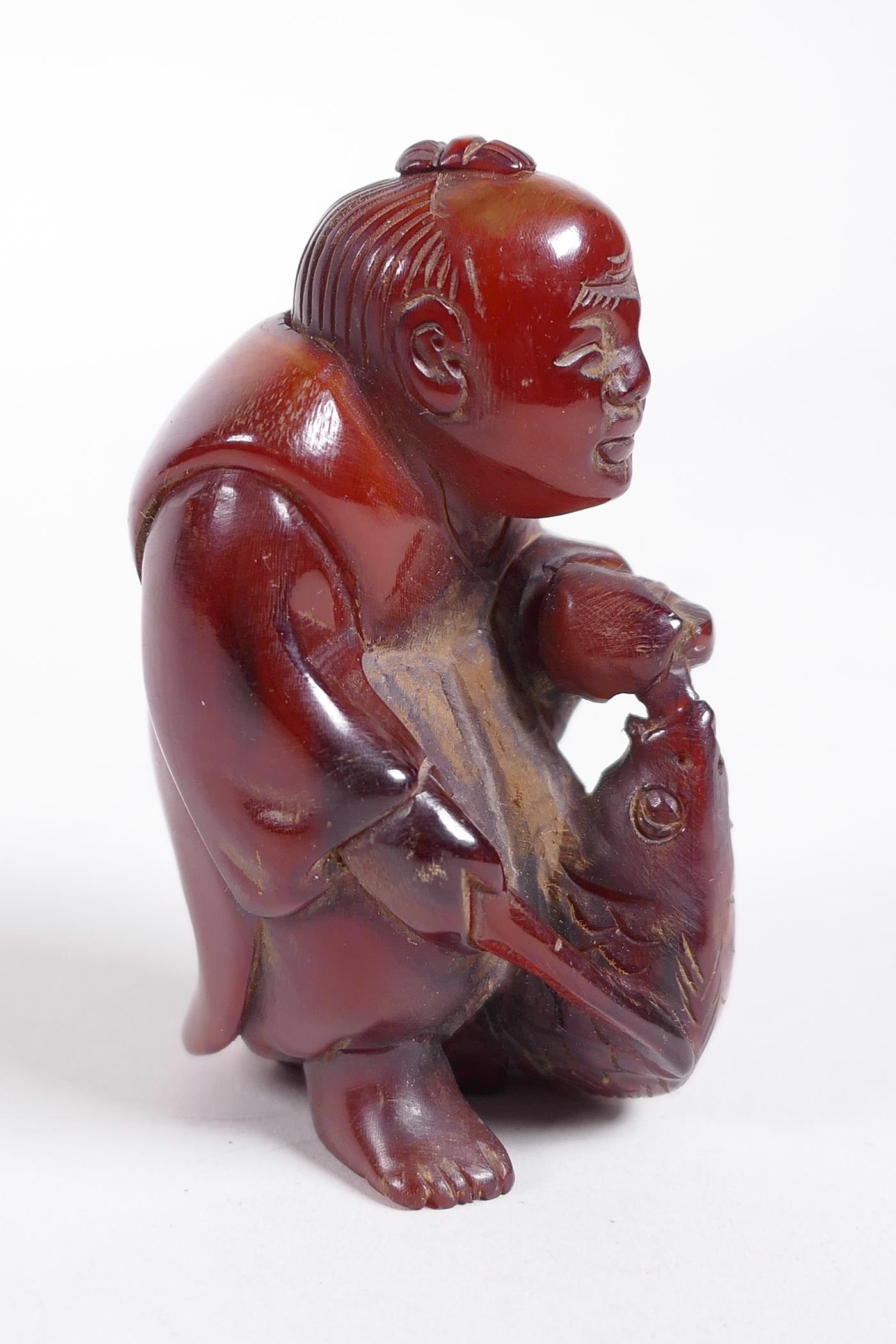 A Chinese carved horn figure of a fisherman, 2½" - Image 2 of 4