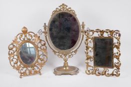 Three gilt metal framed dressing table mirrors, pedestal mirror 15½" high