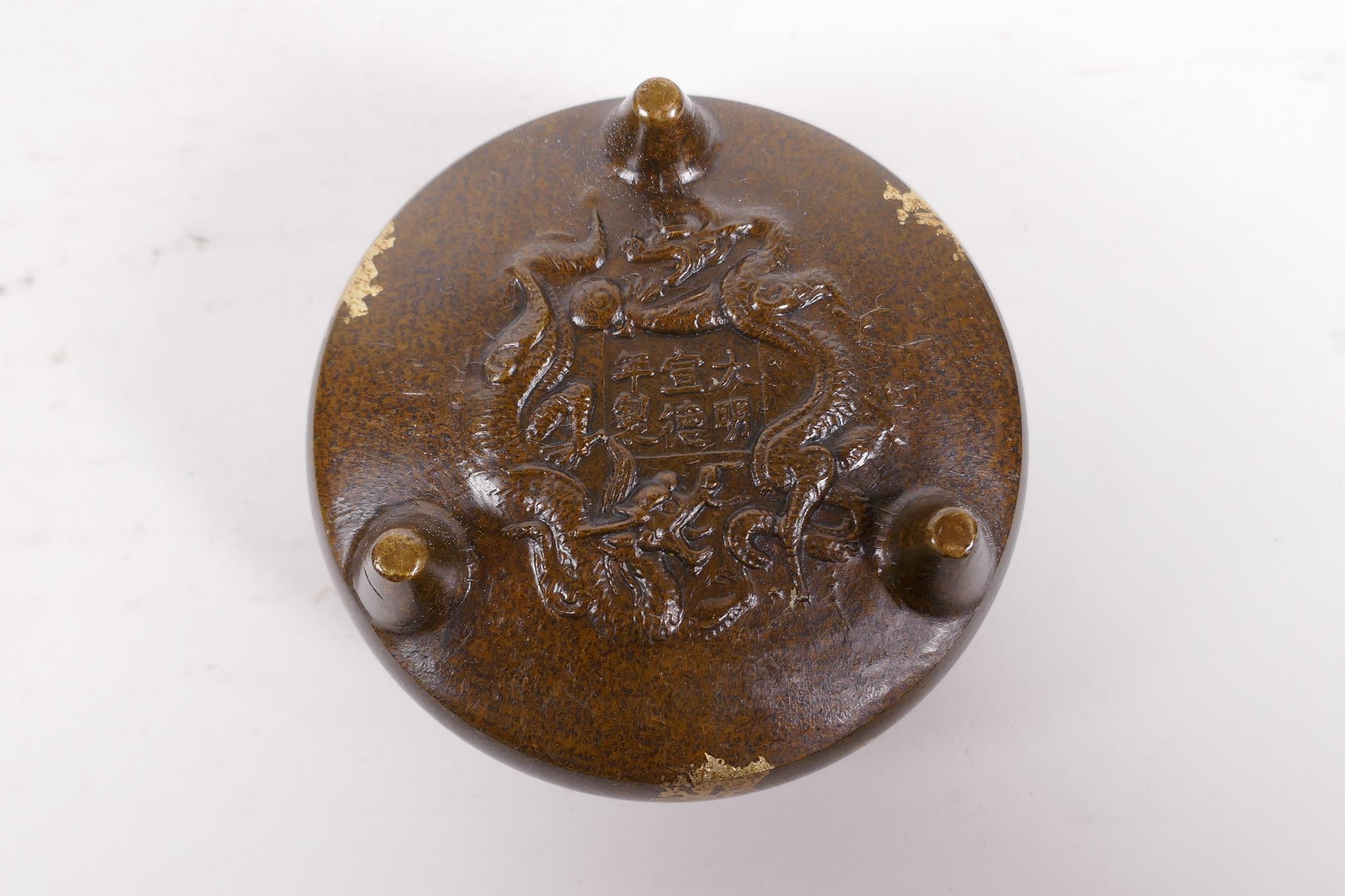 A Chinese bronze censer and cover on tripod supports, with gilt splash decoration, 6 character - Image 4 of 4