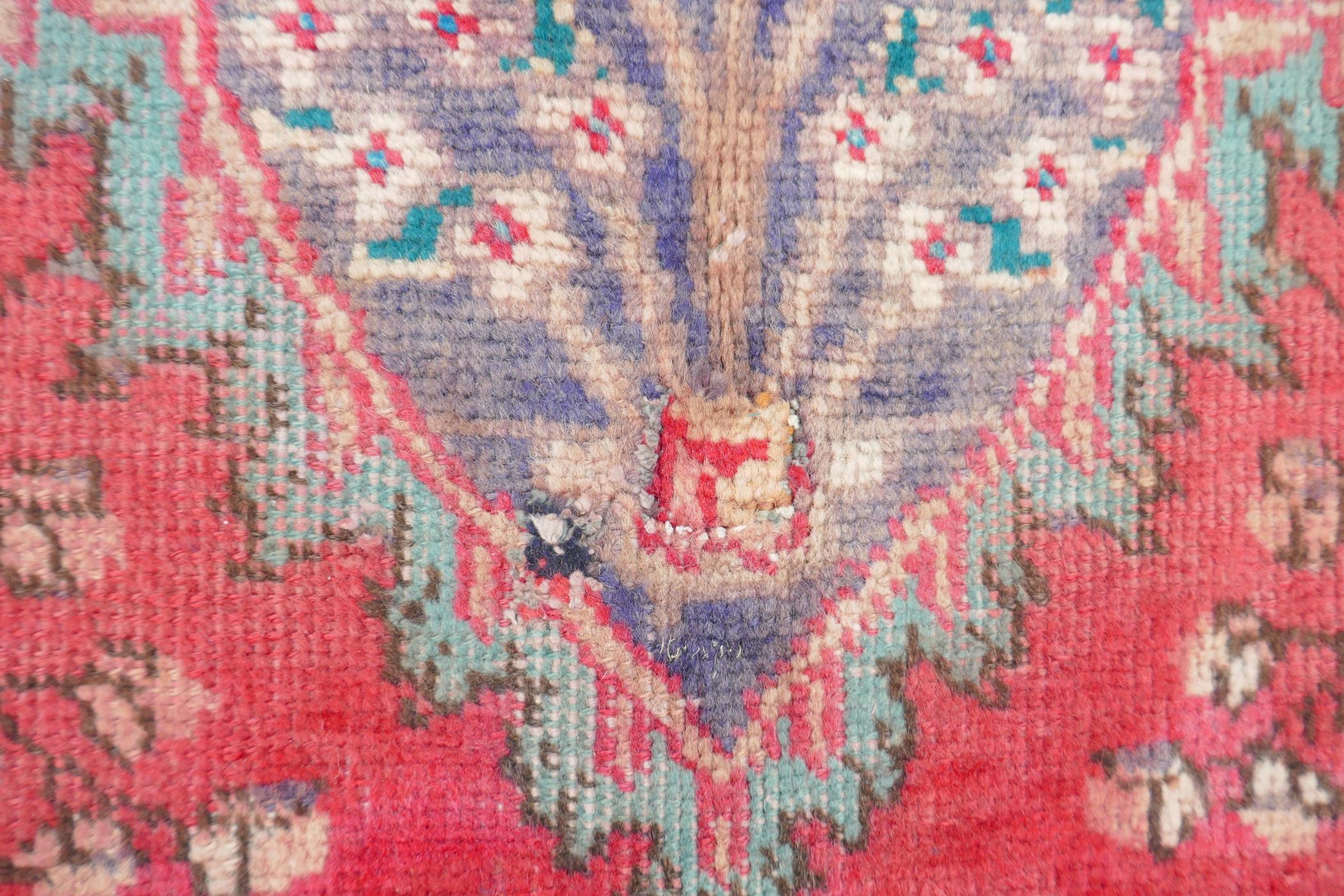 A vintage Iranian carpet from the Tabriz region, with a floral medallion design on a red field - Image 5 of 5