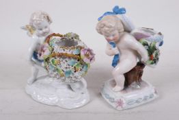A Continental porcelain figure of a cherub pushing a floral encrusted wheelbarrow, 5½" high,
