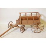 A French child's painted wood cart with iron wheels, late C19th, early C20th