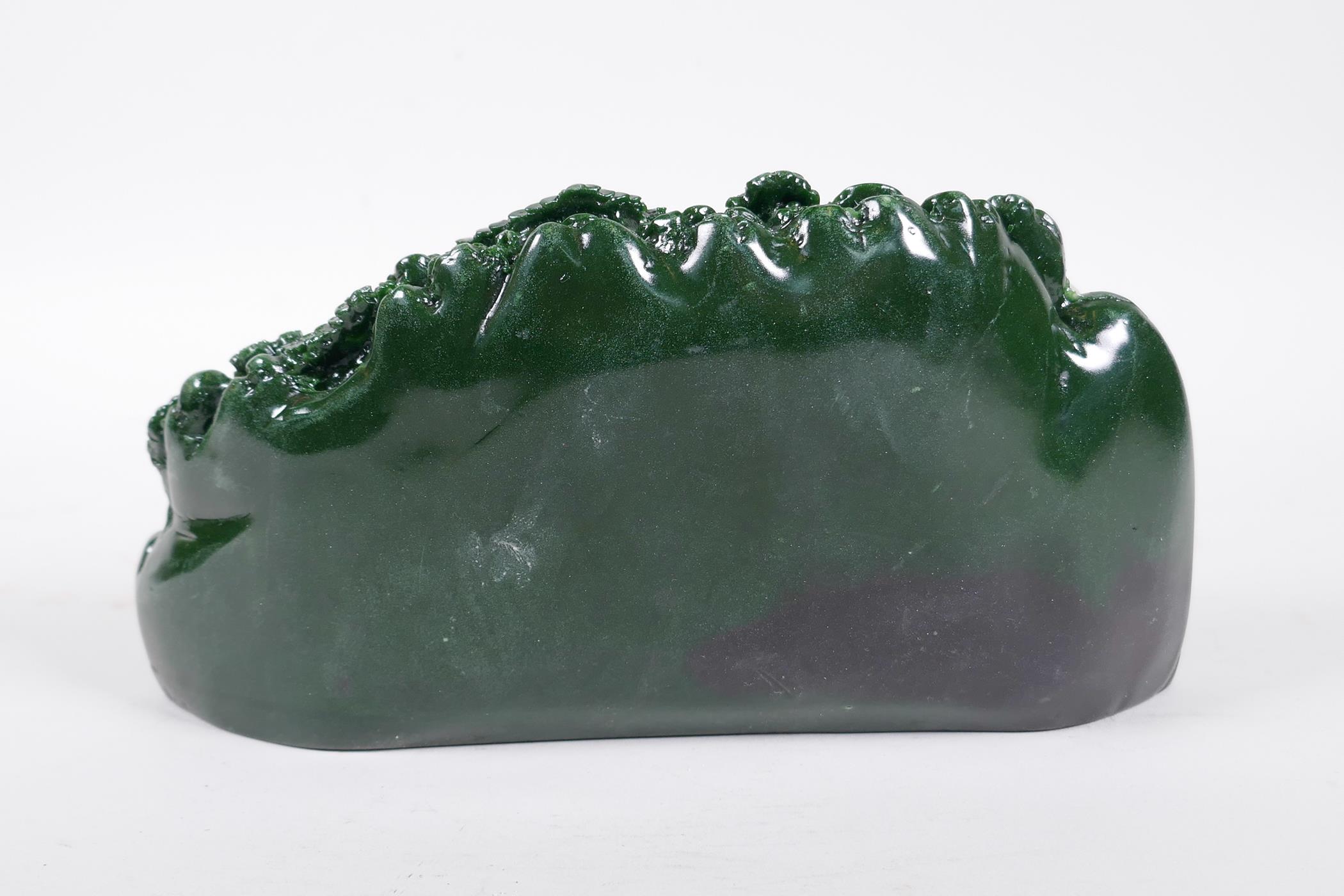 A Chinese reconstituted hardstone ornament carved to depict a mountain village landscape, 8½" long - Image 2 of 2