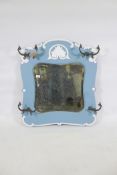 A painted oak wall mirror with stylised palmette decoration and four coat hooks, American, late