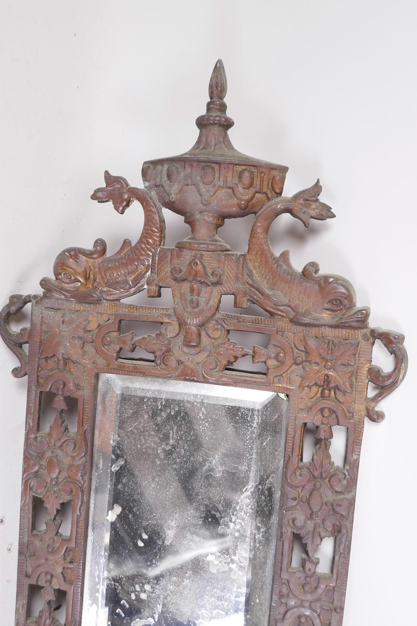A bronzed metal two branch wall sconce, with inset bevelled glass mirror and dolphin crest, 23" x 7" - Image 2 of 3