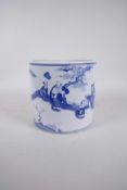 A Chinese blue and white porcelain brush pot decorated with the Eight Immortals in a garden, 7" high