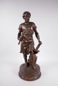 A bronze figure of a blacksmith, inscribed to base 'Le Travail par Duchoisel', late C19th/early