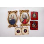 Two oval portrait prints of men in uniform, 4½" x 6½", in gilt decorated ribbon frames, together